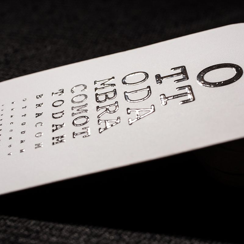 Soft touch business cards with sophisticated embossed typography and luxurious matte finish. Sprint24.