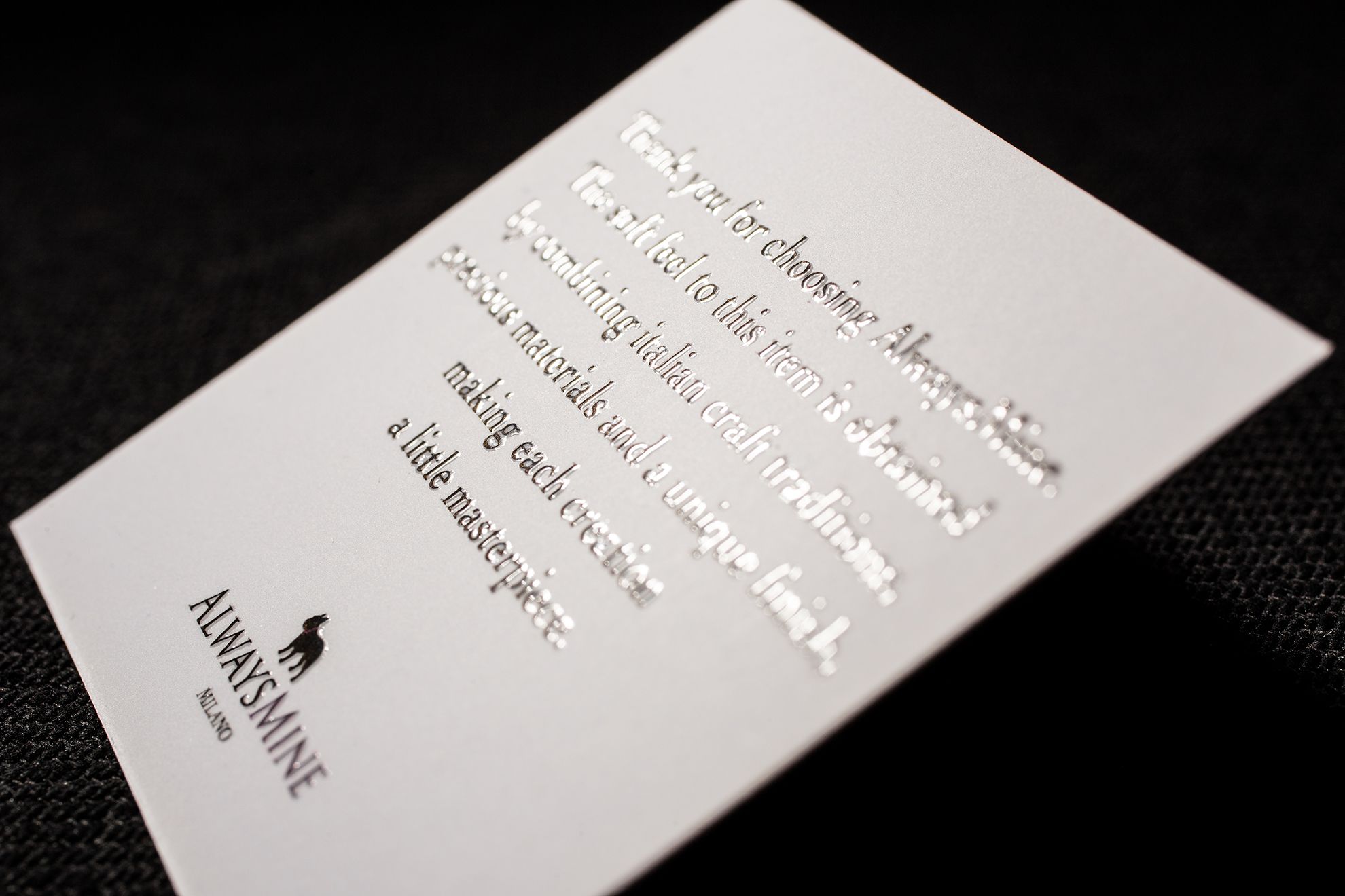 Luxury business card with minimalist design on premium white cardstock for professional brands. Sprint24.
