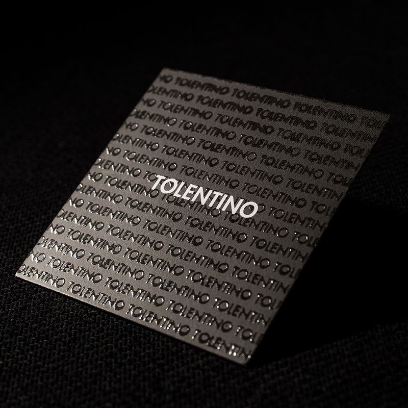 Professional UV-gloss business cards with reflective metallic finish for premium brand presence. Sprint24.