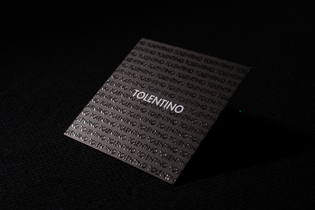 Black square UV business card with full-coverage spot UV pattern Square UV business card on black premium stock with full-coverage spot UV pattern for branding. Sprint24.