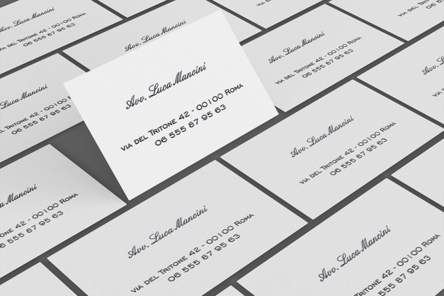 Classic white lawyer business card stack with elegant serif font and. Classic white business cards Avv Luca Mancini lawyer with serif typography and Roman address. Sprint24.