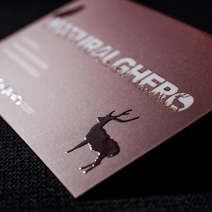 Premium business card with deer silhouette and UV varnish embossing on mauve finish for jewellery. Sprint24.
