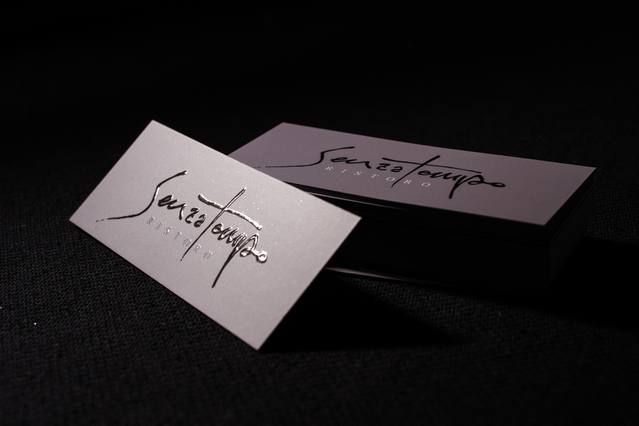 Premium white business card with elegant script branding Elegant minimalist business cards for restaurant professionals with sophisticated typography. Sprint24.