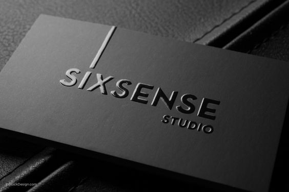 Sixsense Studio dark matte black business card with debossed UV logo. Ultra-premium matte black business card Sixsense Studio with debossed UV gloss logo on leather. Sprint24.