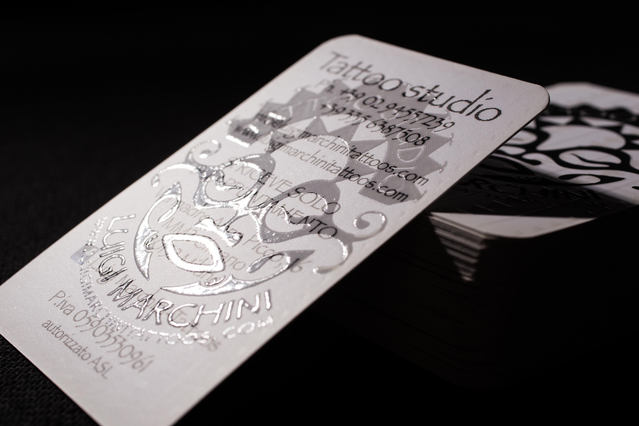 Professional UV varnish business cards with intricate tattoo designs and artistic motifs. Sprint24.